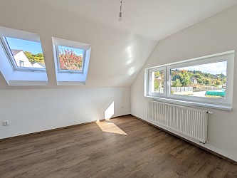 Prodej novostavby domu s garáží a zahradou, Ochoz u Brna