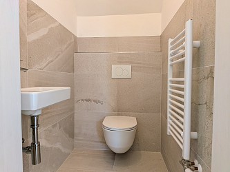 Prodej novostavby domu s garáží a zahradou, Ochoz u Brna