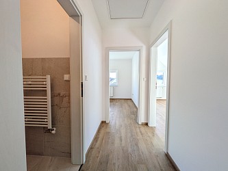 Prodej novostavby domu s garáží a zahradou, Ochoz u Brna