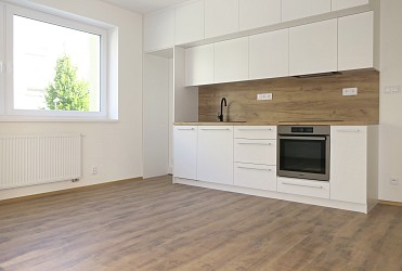 Pronájem novostavby bytu 2+kk s balkonem a garážovým stáním na Kamechách