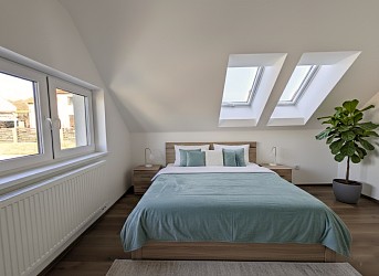 Prodej novostavby domu s garáží a zahradou, Ochoz u Brna