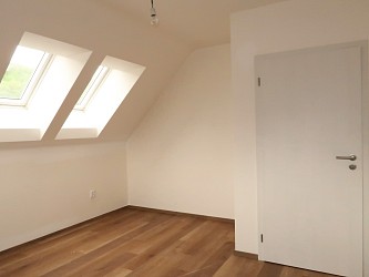 Prodej novostavby domu s garáží a zahradou, Ochoz u Brna